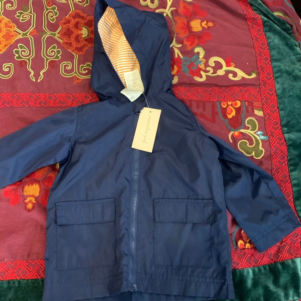 Brand new unisex rain jacket